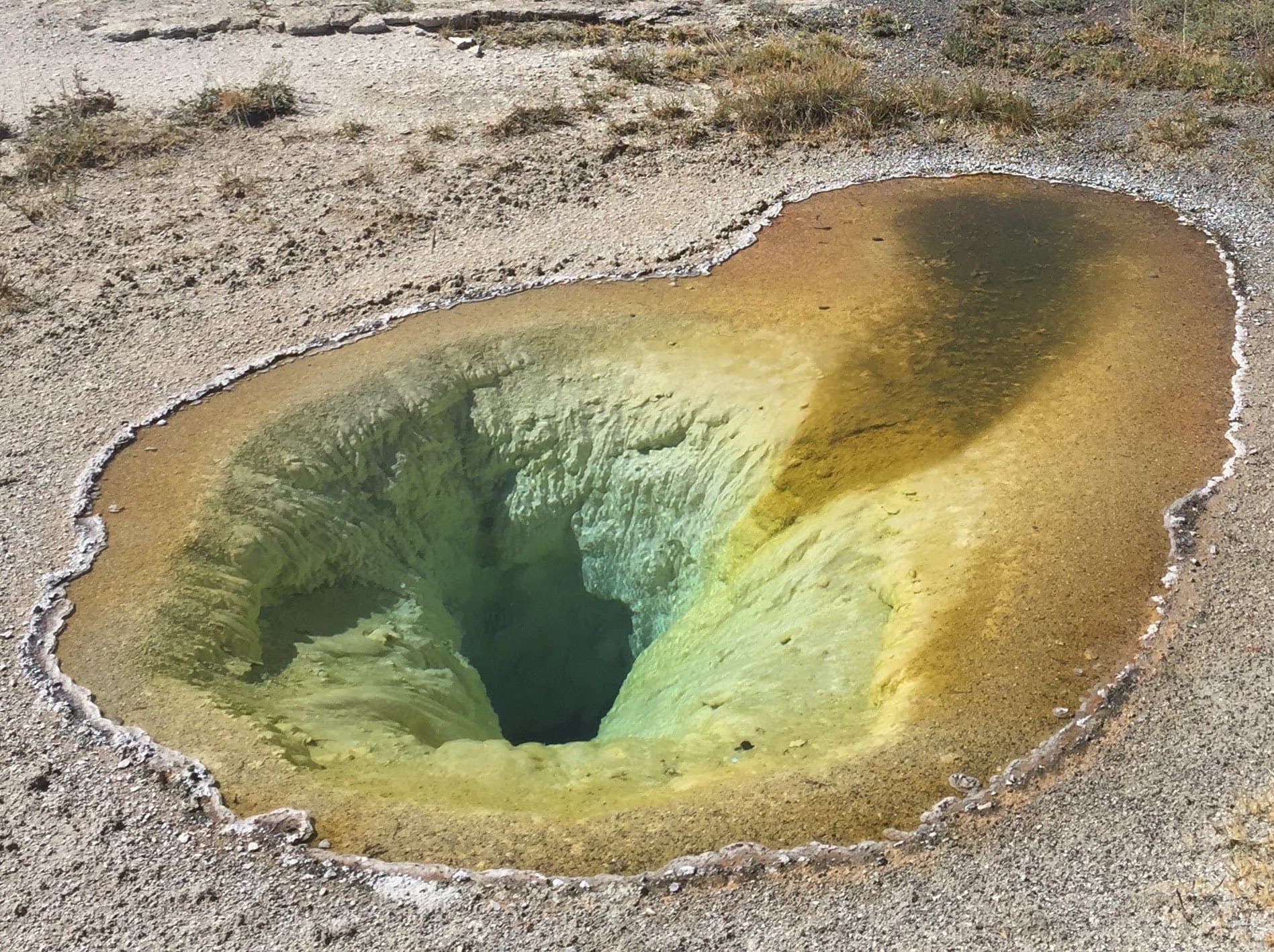 Ear shaped pool in Yellowstone National Park
